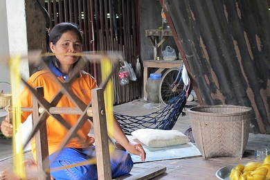 A silk weaver in the Sisaket province