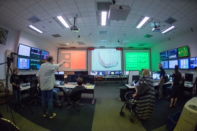 Technicians, engineers, and scientists in Advanced LIGO’s Hanford, California, control room prepare for its first full-scale operational run.