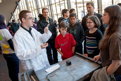 MIT nuclear science and engineering undergrad Jake Hecla teaches the audience about the fundamentals of charged-particle radiation.
