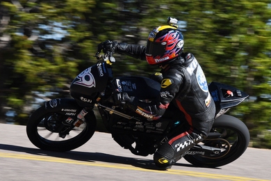 Professional rider and founder of Mirai EV of Japan Yosihiro Kishimoto rides the electric bike designed by the KOMMIT Electric Vehicle Team.