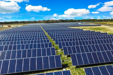 This aerial view shows a similar solar farm in North Carolina, using the same type of solar panels, illustrating what the new project will look like when it is completed by the end of this year.
