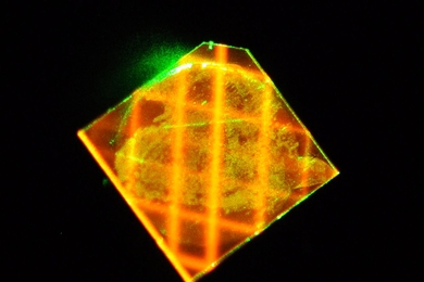 A light-trapping diamond waveguide developed at MIT Lincoln Laboratory is one of the technologies honored with a 2016 R&D 100 Award. The waveguide is capable of efficiently guiding a green excitation laser beam along a meter-long optical path in a millimeter-scale diamond.