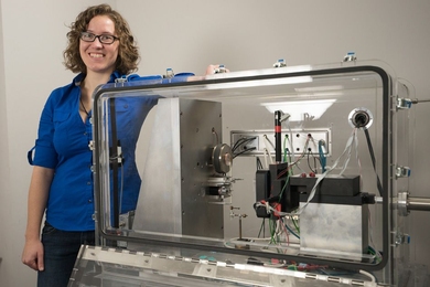 “The most interesting thing about these materials is they function at temperatures above 500 degrees Celsius,” says MIT graduate student Jessica Swallow, pictured with the equipment used for testing the new materials.