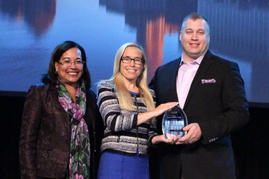 American Society for Engineering Education President Bevlee Watford (left) presents the 2017 ASEE Excellence in Engineering Collaboration Award to Boeing executives Christi Gau Pagnanelli (center) and Mark Cousino.