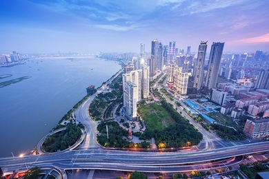 A new study finds that industrial parks in China have led to the growth of nearby “edge cities” that are hubs of diverse economic activity and residential life. The researchers looked at 110 industrial parks near eight cities in China, including the city of Wuhan, pictured here.
