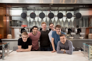 The Spyce team (left to right) includes Luke Schlueter ’16; Michael Farid ’14, SM ’16; Kale Rogers ’16; executive chef Sam Benson; Brady Knight ’16; and culinary director Daniel Boulud. 