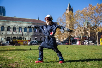 AgeLab researcher Taylor Patskanick exercises in the AGNES suit, which simulates the physical challenges of advanced age.