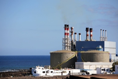 Seaside desalination plants like this typically discharge large volumes of concentrated brine back into the sea. MIT researchers have shown that instead, much of this waste could be turned into useful chemicals.