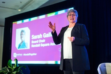 Sarah Gallop, who serves as chair of the board at the Kendall Square Association (KSA) and co-director of MIT’s Office of Government and Community Relations, speaks to the crowd at the KSA’s 10th annual meeting April 3.