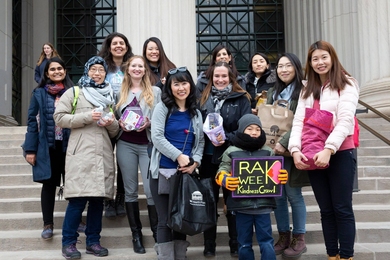 Members of MIT Spouses and Partners Connect spread cheer during their RAK Week Kindness Crawl. 