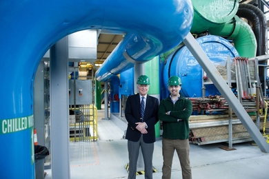 Using their “Cybersafety” methodology, Professor Stuart Madnick (left), graduate student Shaharyar Khan (right), and Professor James Kirtley Jr. (not pictured) identified several cyber vulnerabilities in a small power plant, including a system that poses a risk because it relies on software rather than mechanical safety devices to keep turbines from spinning out of control. 