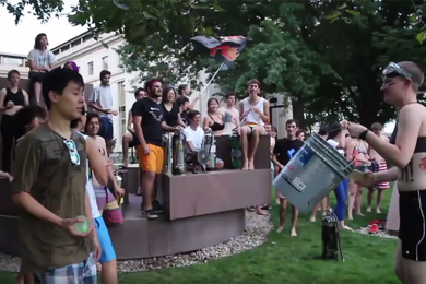 MIT students prepare for Water Wars on Killian Court during the annual Residential Experiences Week.