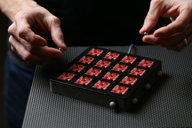 Two permanent magnets are tracked with magnetic field sensors. MIT engineers have devised an algorithm for high-speed tracking of any number of magnets, with significant implications for augmented reality and prosthesis control. 