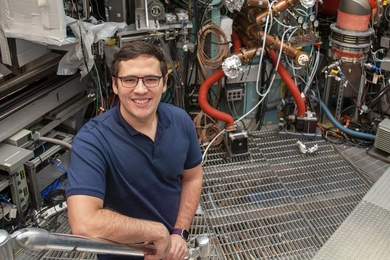 For his prize-winning thesis, Pablo Rodriguez-Fernandez examined data from MIT's Alcator C-Mod tokamak (background).