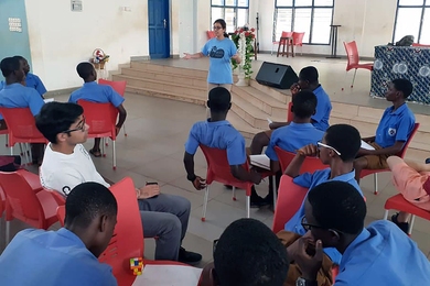 Carolina Ortega, a third-year mathematics student at MIT, talks with students as part of a MISTI-Africa program to connect MIT mathletes with their Ghanaian counterparts.