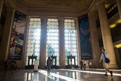 Afternoon light streams into MIT’s Lobby 7.