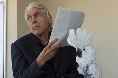 Professor Daniel S. Kemp and Octavian, his avian companion of over 30 years.
