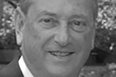 Black and white photo of Robert Logcher in middle age