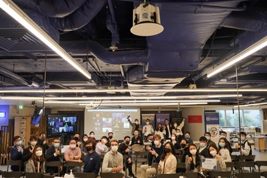 33 Students pose for a group photo with judges at the conclusion of the MEMSI 2022 Showcase.