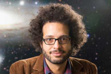 Headshot of Brian Nord against an out-of-focus space background