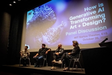 Four panelists in a darkened auditorium, sitting in front of a screen showing a purple AI-generated work of art
