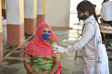 A woman in India being vaccinated