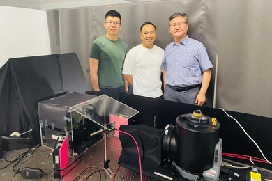 Benny Sng, Duc Thinh Khong, and In-Cheol Jang pose behind a workbench bearing electronic equipment