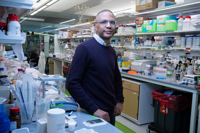 Bryan Bryson in cluttered lab